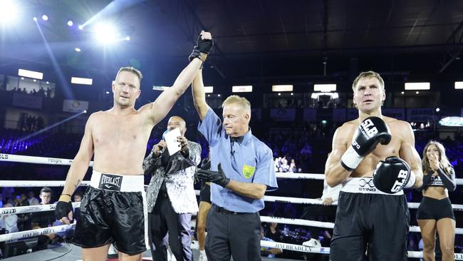 Channel 9 colleague Nathan Brown overcomes Cornes in a charity boxing event.