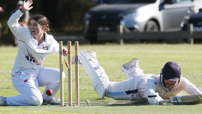 Armstrong Creek’s Grace Jones attempts to run out Barwon Heads batter Darcy Hewitt. Picture: Mark Wilson