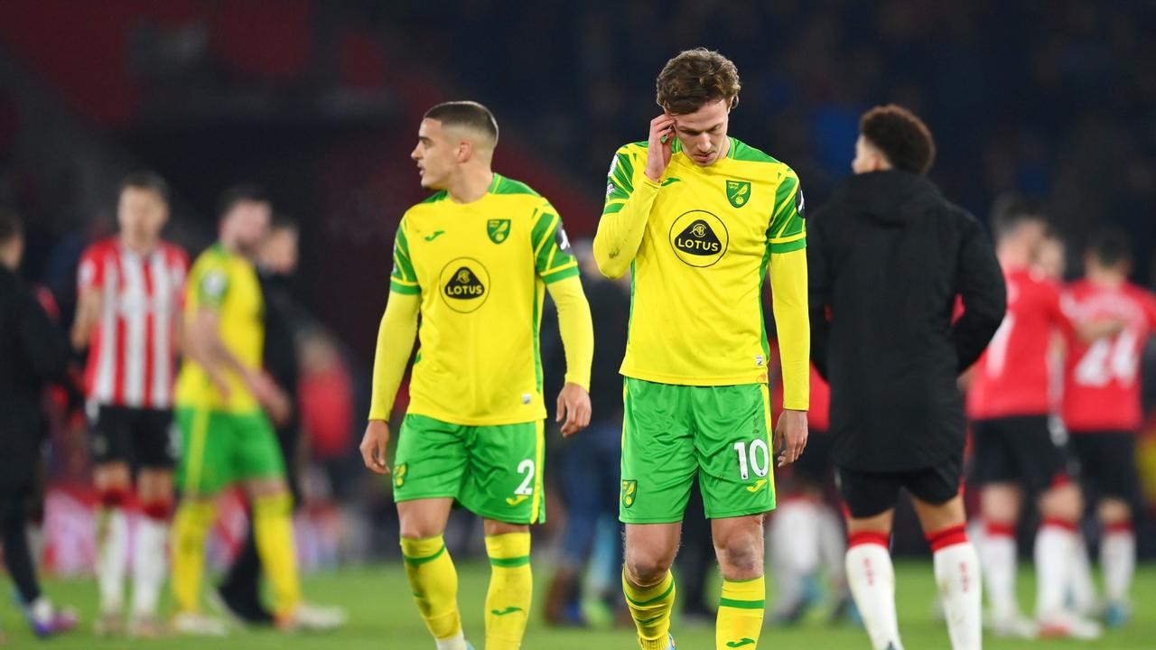 SOUTHAMPTON, ENGLAND – FEBRUARY 25: Kieran Dowell (R) and Max Aarons of Norwich City look dejected following their side's defeat in the Premier League match between Southampton and Norwich City at St Mary's Stadium on February 25, 2022 in Southampton, England. (Photo by Dan Mullan/Getty Images)