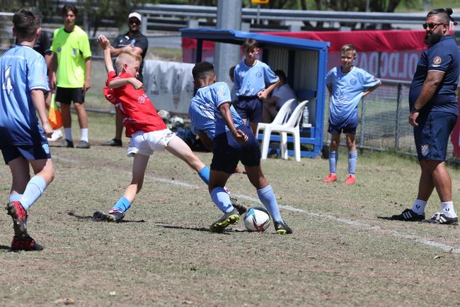 The Premier Invitational football tournament on the Gold Coast. Gold Coast Knights Red v Springfield United under-13s in action. Picture: Mike Batterham.
