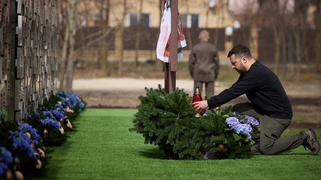 President of Ukraine Volodymyr Zelensky as he honours the memory of the victims of the Russian occupation at a memorial in the town of Bucha. Picture: AFP