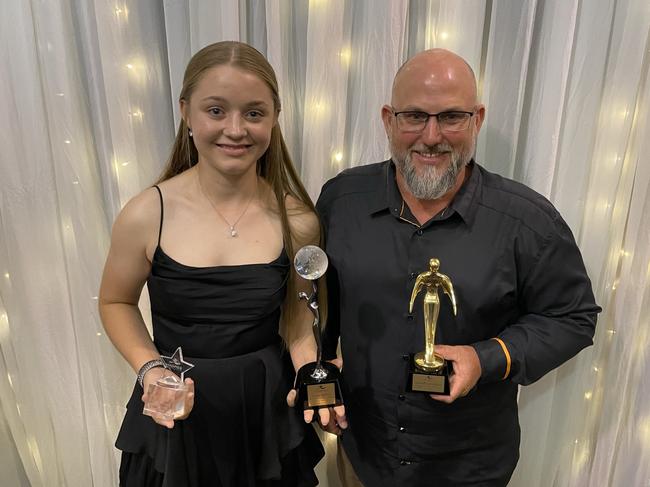 Runner-up junior female athlete of the year Ella Walz with volunteer of the year Russell Cunington. Ella is also holding the trophy for senior female athlete of the year Zayna Balfour who could not make the 2022 Magpie of the Year event at Magpie Sporting Club on October 28, 2022. Picture: Rae Wilson