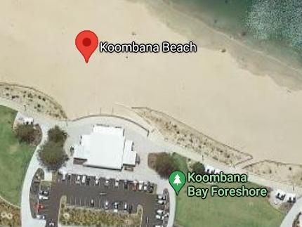 The dying father and his daughter sat on a picnic rug at the beach. Picture: Google Maps