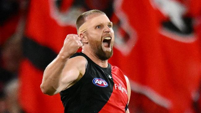 MELBOURNE, AUSTRALIA - MAY 11: Jake Stringer of the Bombers celebrates a goal during the round nine AFL match between Essendon Bombers and Greater Western Sydney Giants at Marvel Stadium, on May 11, 2024, in Melbourne, Australia. (Photo by Morgan Hancock/AFL Photos/via Getty Images)