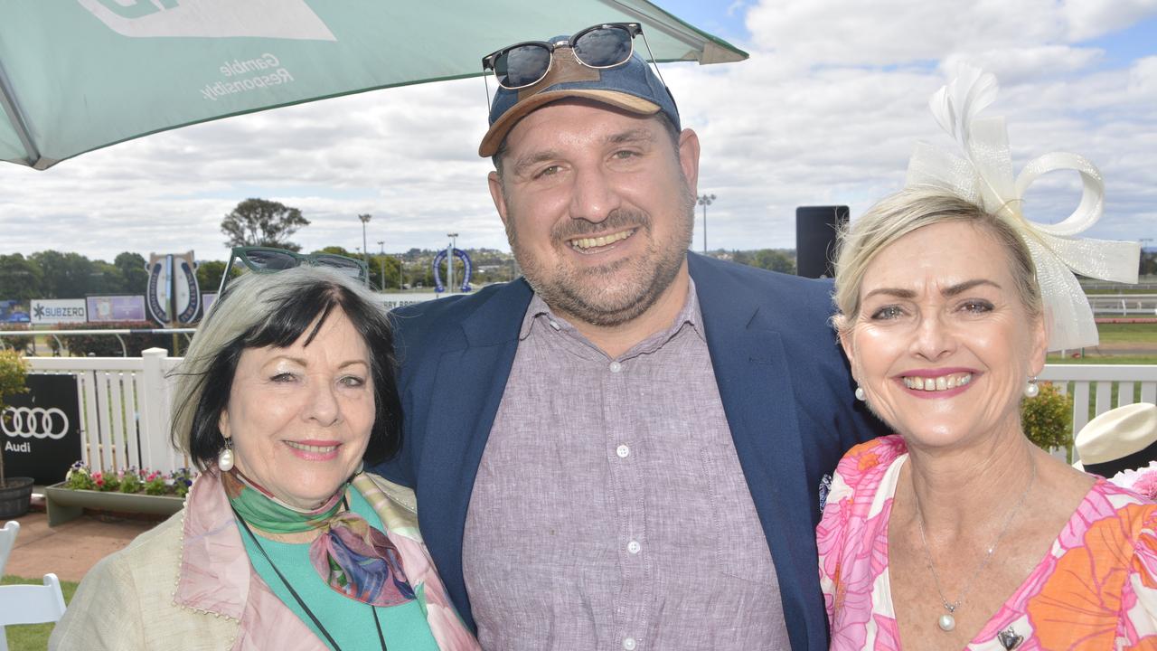 Meg Robinson, Chris Isaac and Penny Eccleston at the 2023 Audi Centre Toowoomba Weetwood race day at Clifford Park Racecourse.
