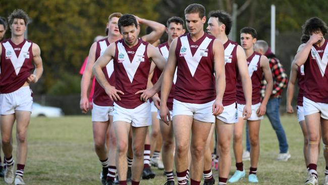Mt Evelyn players walk off the ground after the game was a draw. Picture: Andrew Batsch