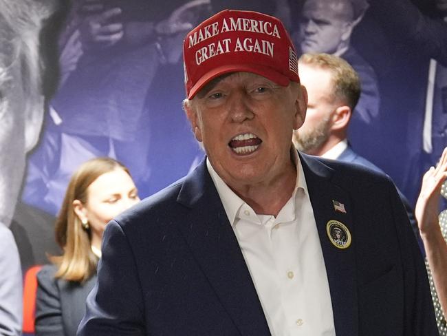 Republican presidential nominee former President Donald Trump visits his campaign headquarters, Tuesday, Nov. 5, 2024, in West Palm Beach, Fla. (AP Photo/Evan Vucci)