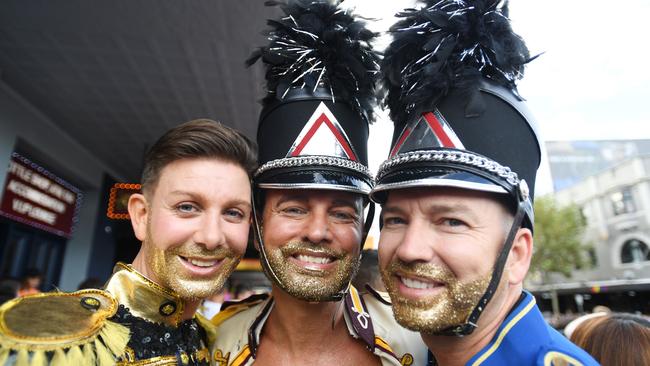 Even beards were given a bit of sparkle — golden boys Richard Tompkinson, Scott Harker and Brad Harker. Picture: Tracey Nearmy