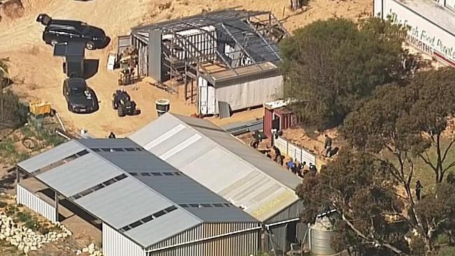 Police search a property linked to the Hells Angels Bikie club at Ponde, South Australia today. Picture; 7 News Adelaide