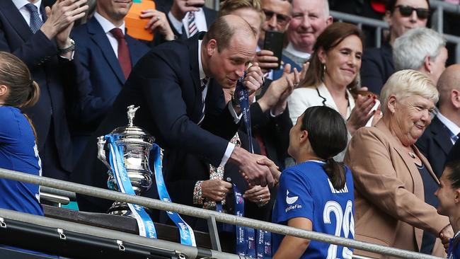 Kerr with Prince William. Picture: Getty Images