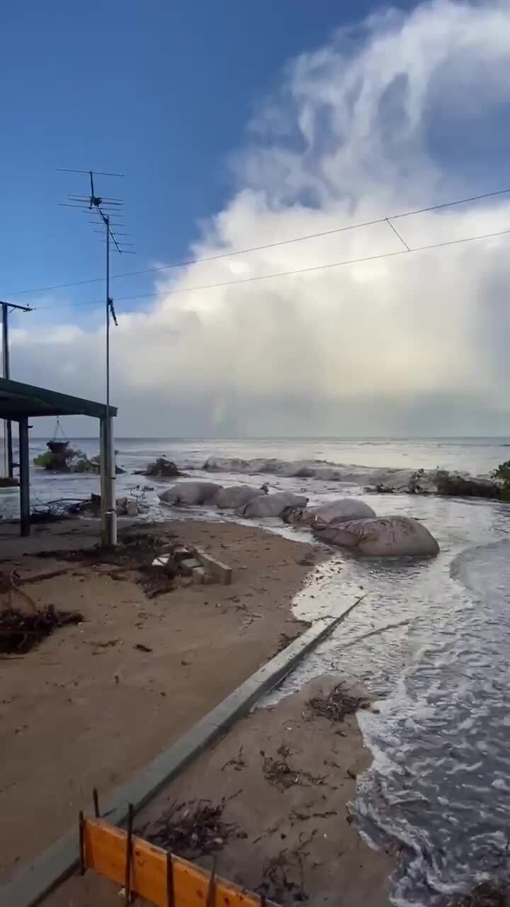 Flooded road at Foul Bay as wild weather hits SA
