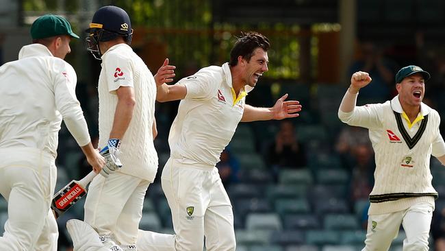 Australian paceman Pat Cummins celebrates after he took the final England wicket to secure the Ashes series for Australia.