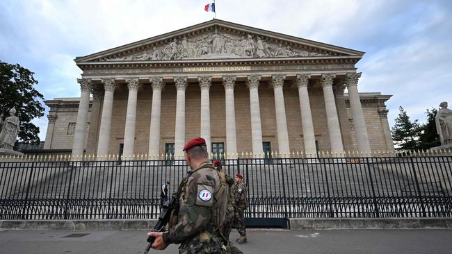 French soldiers patrol in front of the French National Assembly ahead of the 2023 World Para Triathlon in Paris. Picture: Emmanuel Dunand / AFP