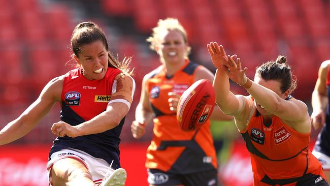 Kate Hore of Melbourne and Alyce Parker of the Giants during the AFLW semi-final.