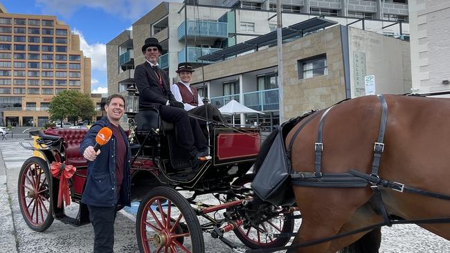 Sunrise presenter Sam Mac with the team from Hobart Heritage Horse Drawn Carriages. Picture: Genevieve Holding