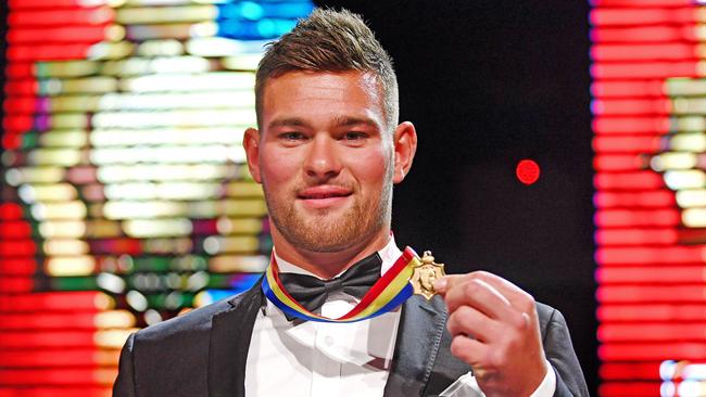 Mitch Grigg with his second Magarey Medal at Adelaide Oval. Picture: Tom Huntley