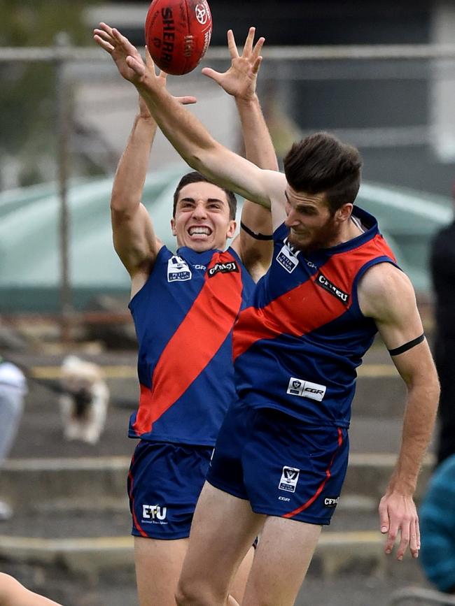 Jesse Corigliano rises above a pack to mark for Coburg. Picture: Kylie Else