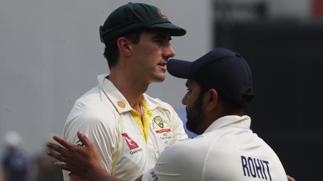 Pat Cummins and Indian captain Rohit Sharma.