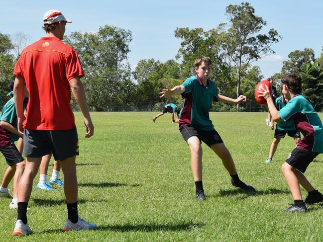 Gold Coast Suns AFL player Sam Clohesy at a training session held on O'Loughlin Catholic College grounds for middle school students. Picture: Sierra Haigh