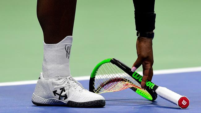 The smashed racquet of Williams, which earned a second code violation. Picture: Getty