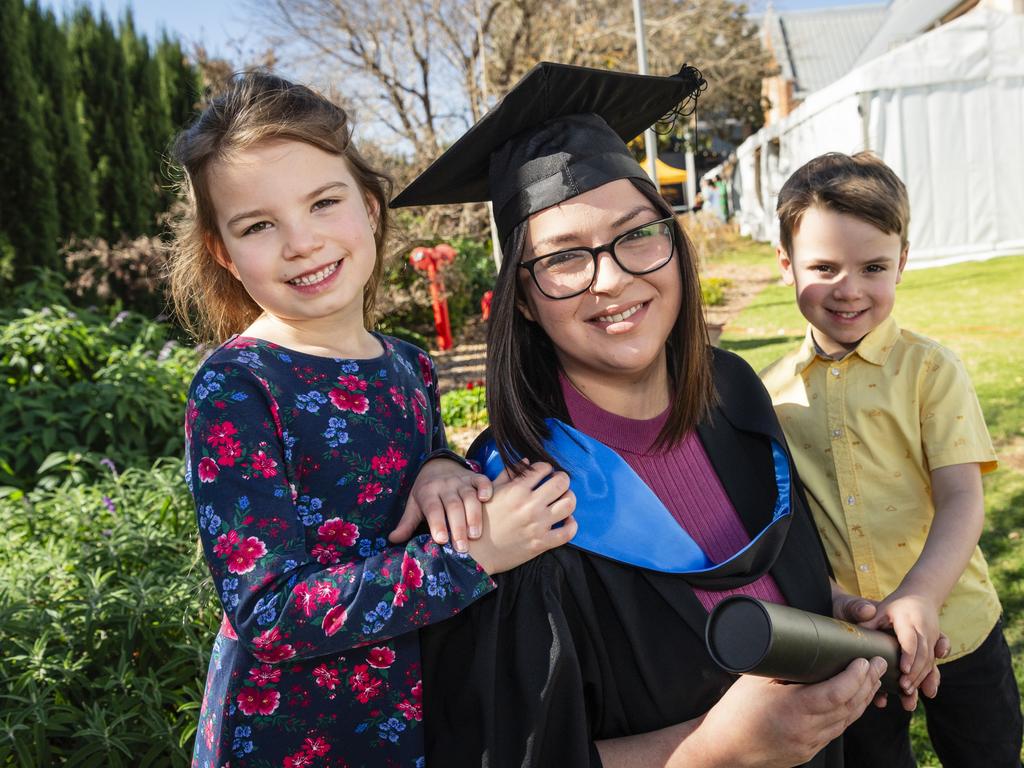 Bachelor of Biomedical Sciences graduate Maddi Geyer with her daughter Ava Loomans and son Noah Loomans at a UniSQ graduation ceremony at Empire Theatres, Wednesday, June 28, 2023. Picture: Kevin Farmer