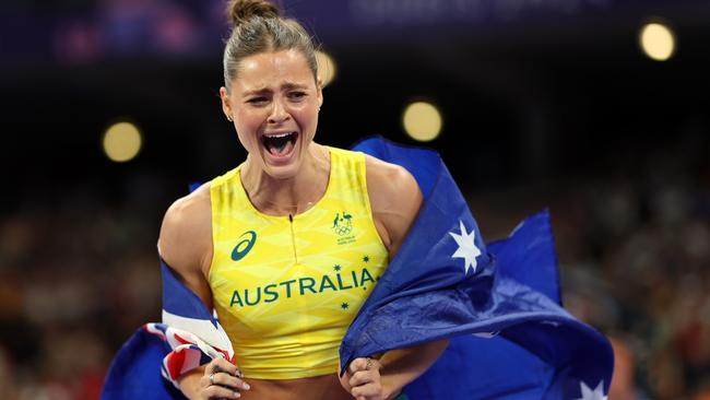 PARIS, FRANCE - AUGUST 07: Gold medalist Nina Kennedy of Team Australia reacts after winning in the Women's Pole Vault Final on day twelve of the Olympic Games Paris 2024 at Stade de France on August 07, 2024 in Paris, France. (Photo by Cameron Spencer/Getty Images)