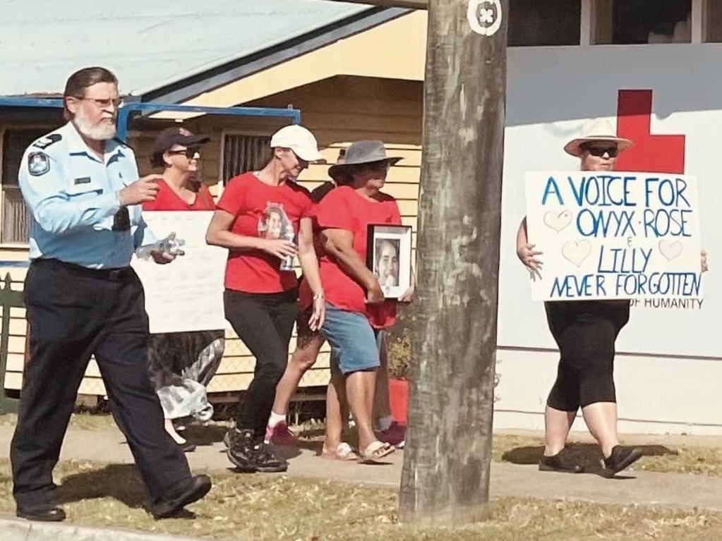 Ms Lambert led the march carrying a sign for Onyx and another high school student who died. Picture: Facebook