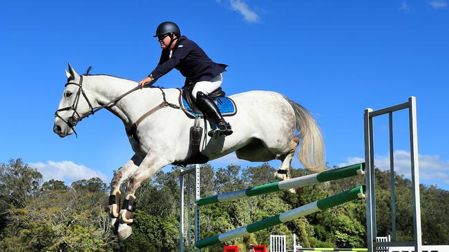 Todd Lane and Watermark take part in the Winter Show Jump Spectacular at Oxenford on Sunday. Scott Powick Newscorp