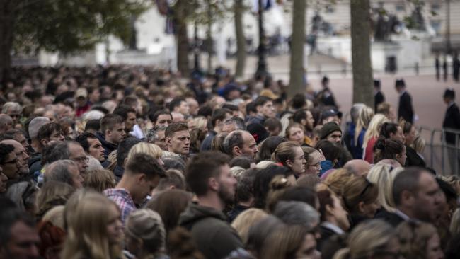 Crowds gather on The Mall near Buckingham Palace to watch the funeral of Queen Elizabeth II on Monday night (AEST). Picture: Getty Images