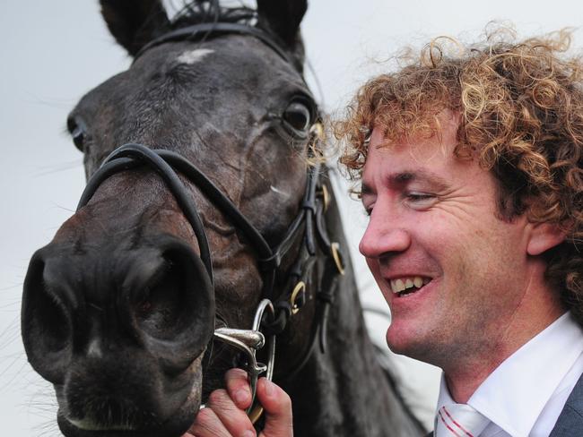 WARRNAMBOOL, AUSTRALIA - MAY 07: Trainer Ciaron Maher poses with Regina Coeli after winning Race 7 the Wheelie Waste Grand Annual Steeplechase during Grand Annual Day at Warrnambool Racing Club on May 7, 2015 in Warrnambool, Australia. (Photo by Vince Caligiuri/Getty Images)