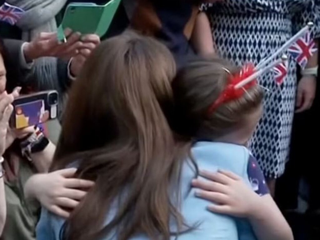 Princess Catherine comforts a little girl who burst into tears after seeing her. Picture: BBC