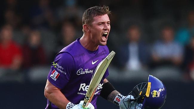 MELBOURNE, AUSTRALIA - DECEMBER 29: Ben McDermott of the Hurricanes celebrates after scoring a century during the Men's Big Bash League match between the Melbourne Renegades and the Hobart Hurricanes at Marvel Stadium, on December 29, 2021, in Melbourne, Australia. (Photo by Mike Owen/Getty Images)