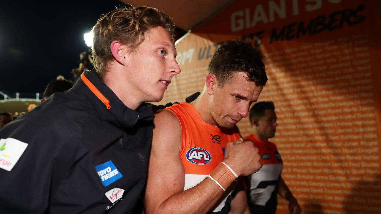 Lachie Whitfield and Brett Deledio after the win over the Western Bulldogs.