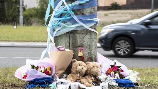 Teddy bears and flowers at the memorial site after the crash. Picture: Monique Harmer