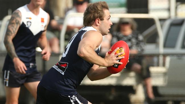 Dillon Sharp in action for Melton South. Picture: Hamish Blair