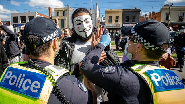 Protesters clash with police at the Queen Victoria Market in September 2020 in Melbourne. Picture: Getty Images