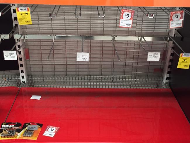 Supplies are dwindling fast at Charlestown Woolworths. Picture: Neil Keene