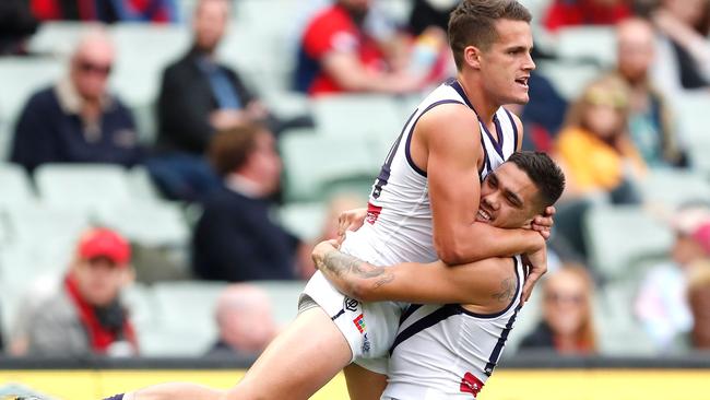 Harley Balic (left) celebrates his first AFL goal. Picture: Adam Trafford/AFL Media/Getty Images