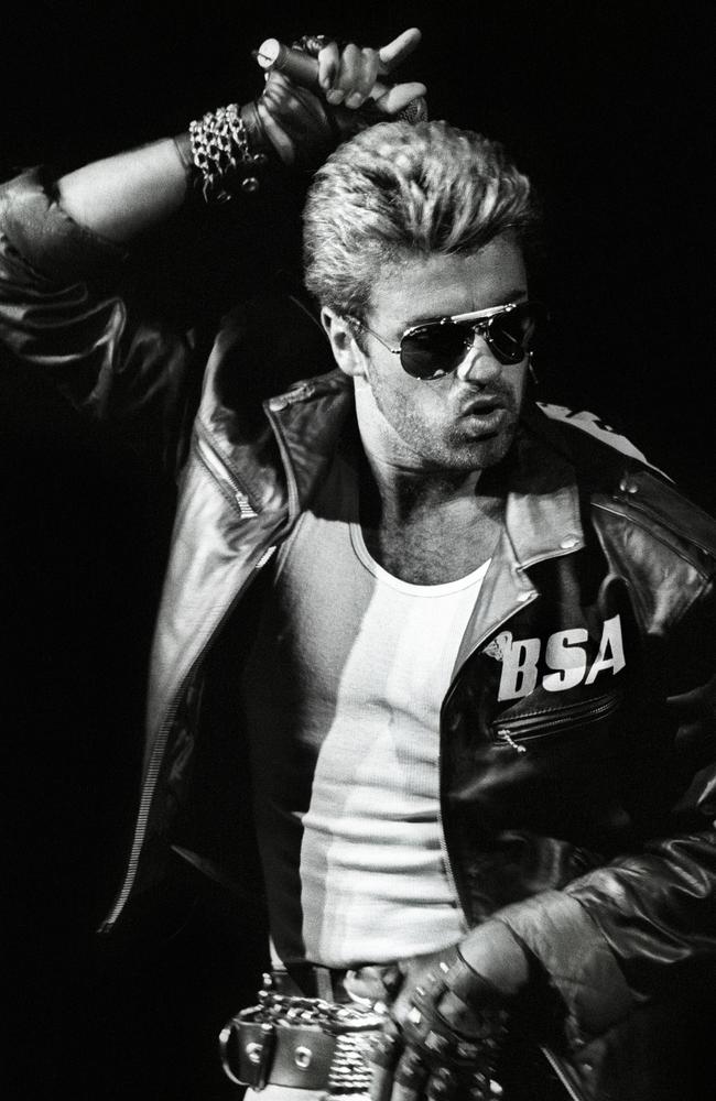 George Michael performs on stage, wearing a leather jacket and sunglasses, on the Faith Tour in Rotterdam, Netherlands, in 1988. Picture: Rob Verhorst/Redferns