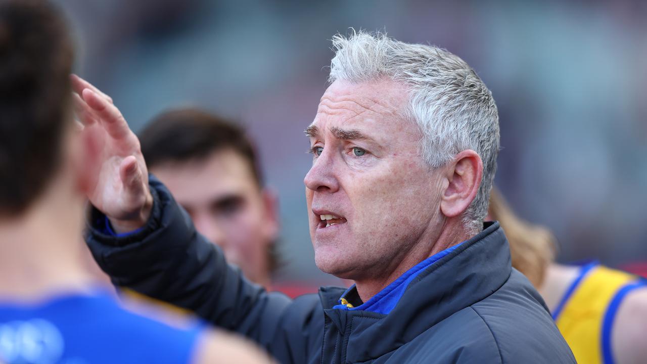 MELBOURNE, AUSTRALIA - JULY 07: Adam Simpson, Senior Coach of the Eagles talks to his players during the round 17 AFL match between Melbourne Demons and West Coast Eagles at Melbourne Cricket Ground on July 07, 2024 in Melbourne, Australia. (Photo by Graham Denholm/AFL Photos/via Getty Images)