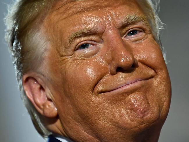 US President Donald Trump looks on after delivering his acceptance speech for the Republican Party nomination for reelection during the final day of the Republican National Convention at the South Lawn of the White House in Washington, DC on August 27, 2020. (Photo by Brendan Smialowski / AFP)