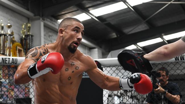 Can Whittaker defend his title on home soil for the first time? AAP Image/James Ross.