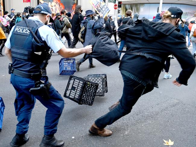 SYDNEY, AUSTRALIA - NewsWire Photos,June 27, 2022: Protesters march through Sydney's CBD disrupting the traffic as part of Blockade Australia protests. Picture: NCA NewsWire / Jeremy Piper
