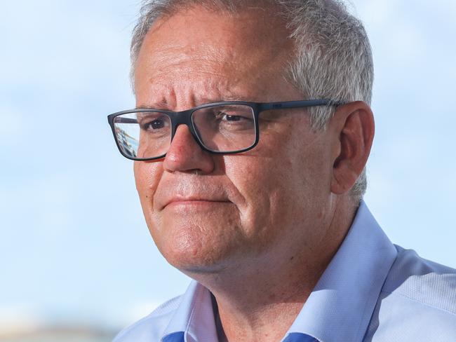 Prime Minister Scott Morrison speaks to assembled media as he visits HMAS COONAWARRA Naval Base in Darwin.Picture: Glenn Campbell