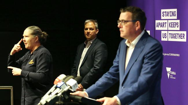 Victorian Chief Health Officer Brett Sutton looks on as Victorian Premier Daniel Andrews holds a press conference. Picture: Ian Currie