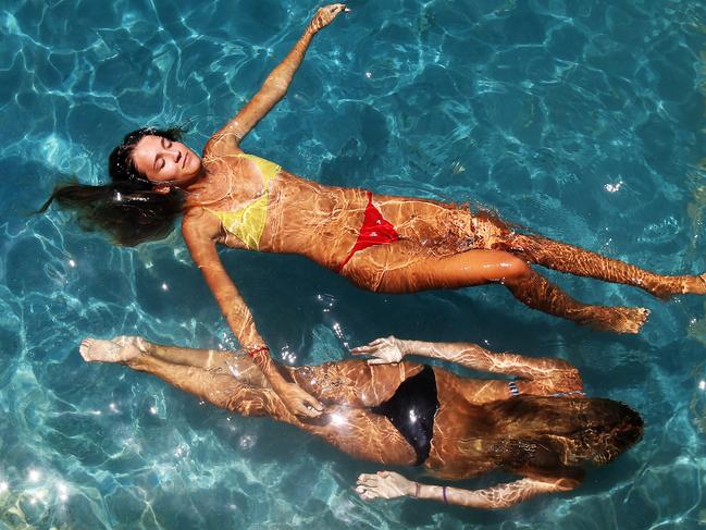 Pictured is Mia Wood 15 and Nina Deal 15, enjoying the cool water at Bronte Beach pool during the scorching Sydney heat today. Picture: Tim Hunter.