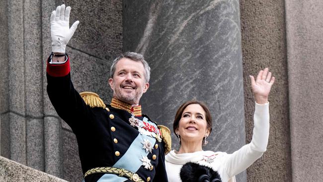 King Frederik X of Denmark and Queen Mary of Denmark wave to the crowd after the a declaration of the King's accession to the throne. Picture: AFP