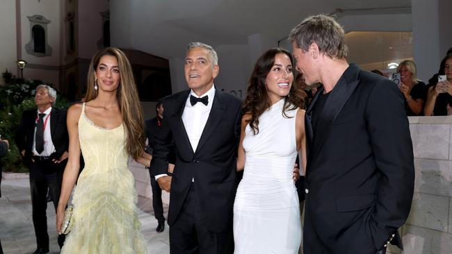 Amal Clooney, George Clooney, Ines de Ramon and Brad Pitt during the 81st Venice International Film Festival. Picture: Getty Images.