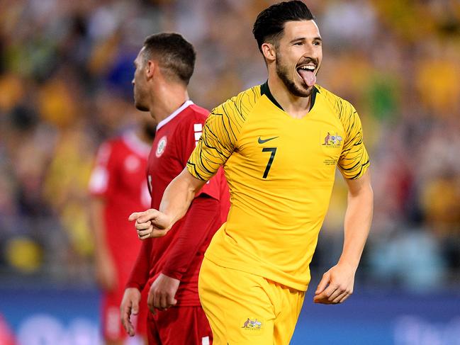 Mathew Leckie of the Socceroos celebrates after scoring a goal during the International friendly match between Australia and Lebanon at ANZ Stadium in Sydney, Tuesday, November 20, 2018. (AAP Image/Dan Himbrechts) NO ARCHIVING, EDITORIAL USE ONLY