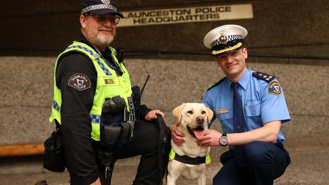 Constable Gavin Storay with police dog Nikki and new Northern District Commander Marco Ghedini outside the Launceston Police Station. Picture: Stephanie Dalton